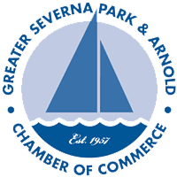 coffee shop owner standing in doorway